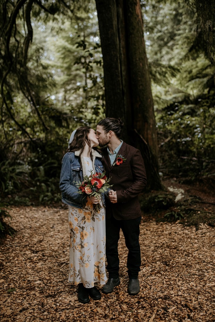 Tofino Vows couple kiss after wedding ceremony at Wickaninnish Inn