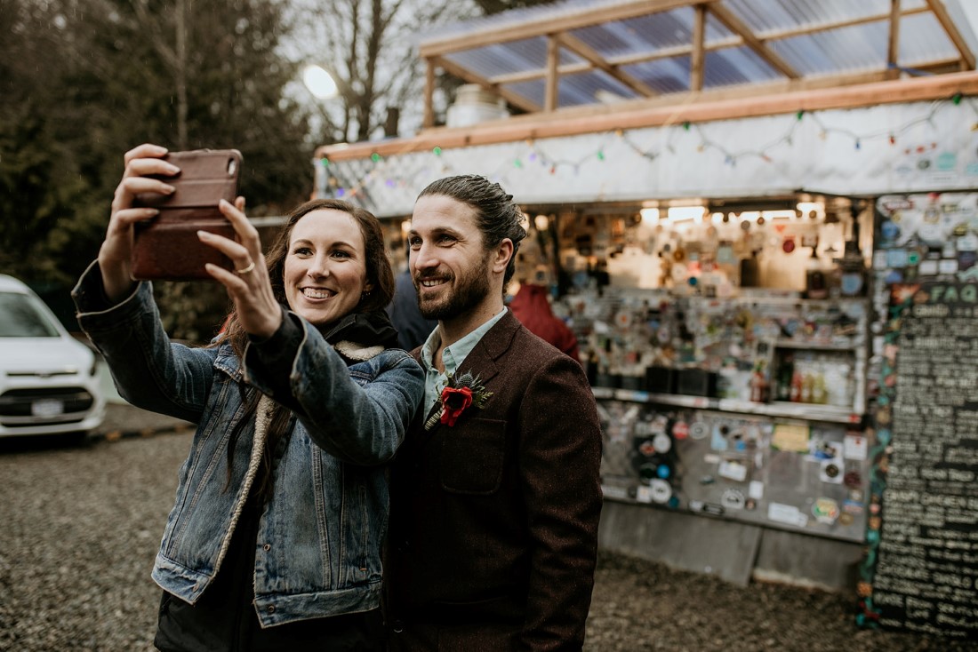 Tofino Vows Newlyweds take a selfie at Tacofino truck