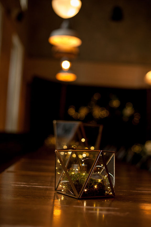 Twinkle lights inside of vase on wedding table at Medina Cafe in Vancouver