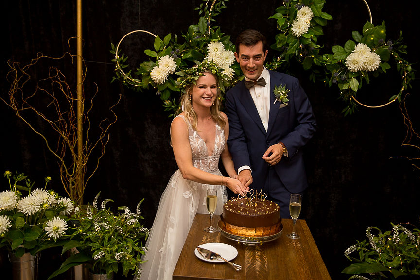 Newlyweds cut their cake at Meridan Cafe Vancouver