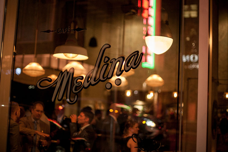 Medina cafe wedding table seen through front glass window in Vancouver