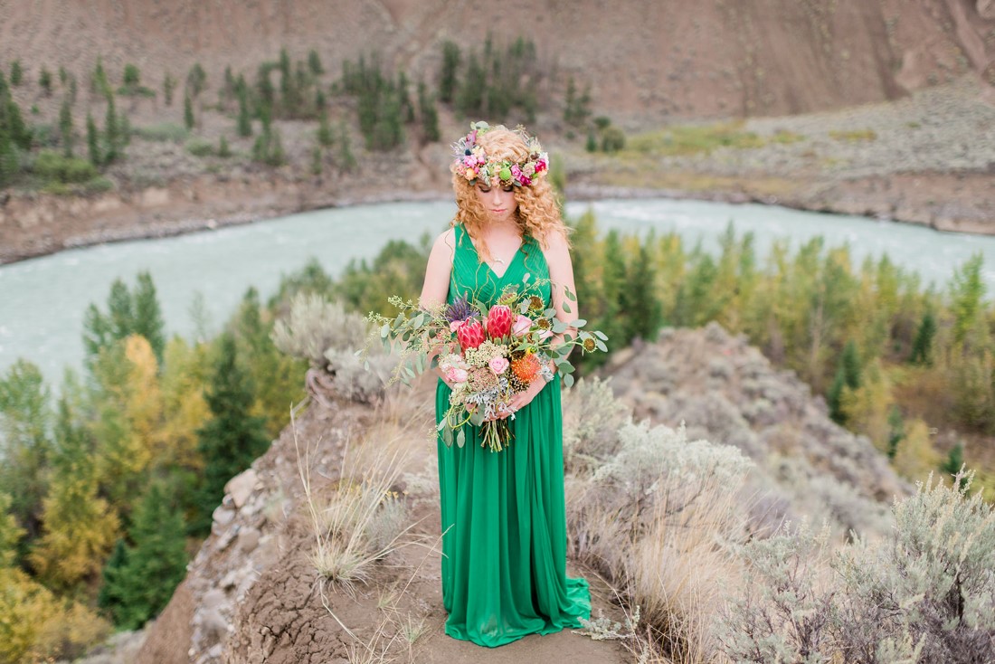 Desert Boho Indpired Bride in emerald green dress with hair wreath by Roberta McLean Photography