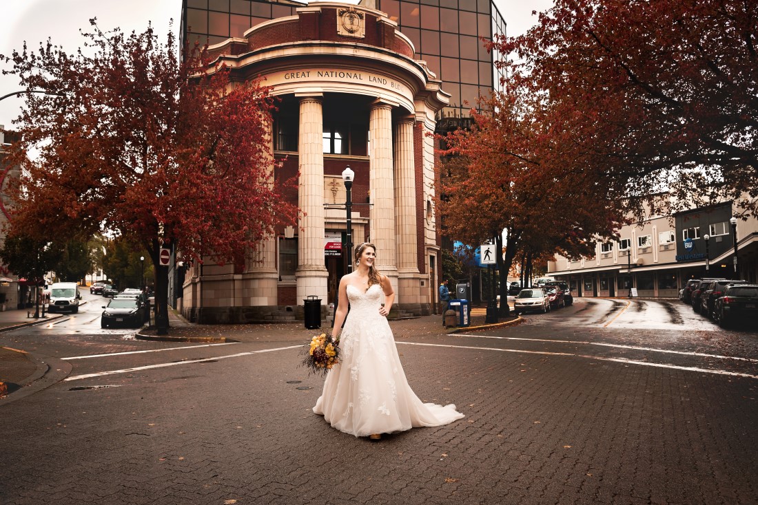 Bride laughs as she poses in the streets of Nanaimo