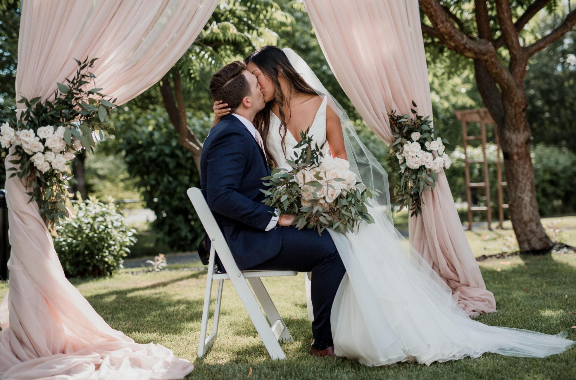 Newlyweds kiss after ceremony in Okanagan Valley