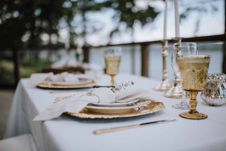 Dolphin's Resort Wedding Romance table with golden wine glasses and mountain view in Campbell River