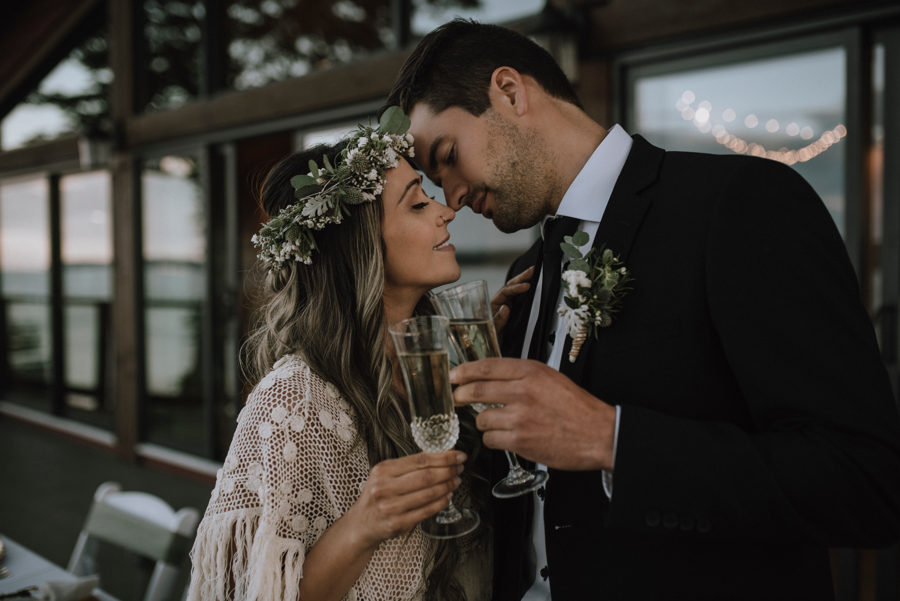 Bride and groom drink champagne by All in 1 Party Supplies Comox Valley