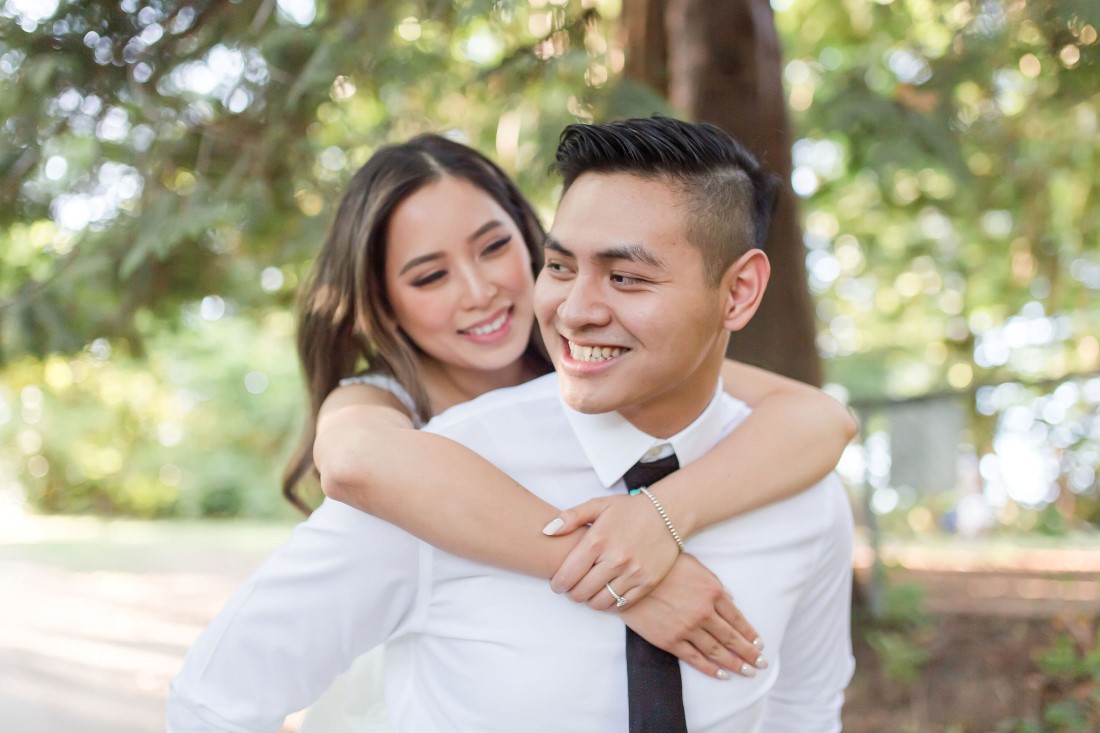 Bride to be hitches a ride on fiance back in Vancouver park