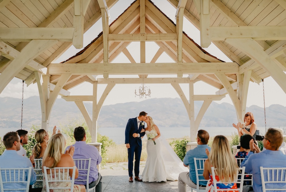 Couple marry under the large roof at Sanctuary Gardens in Kelowna