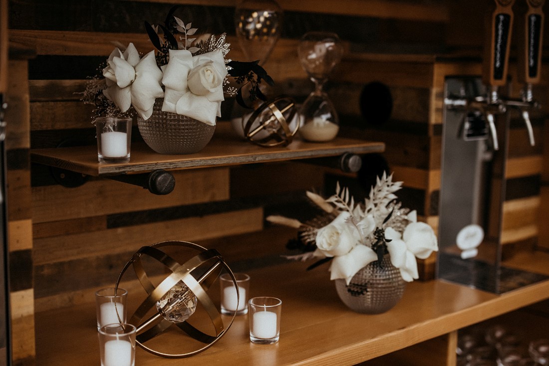 White roses and pampas grass on Bubble Bus Co tap are on their truck by En Vied Events Vancouver Island