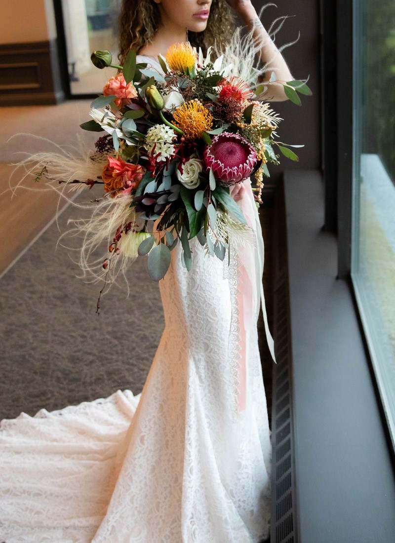 Stunning bridal bouquet of protea and yellow roses by Maple Ridge Floral Ltd Vancouver 