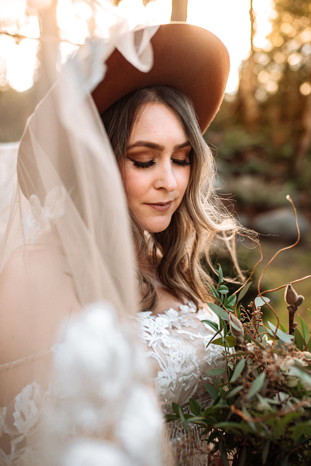 She Wore Flowers Breide with veil and bouquet