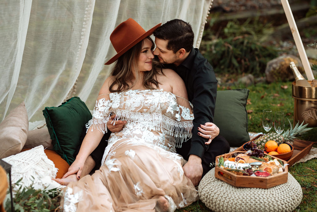 Eloping couple having picnic by Madison Lane on Vancouver Island