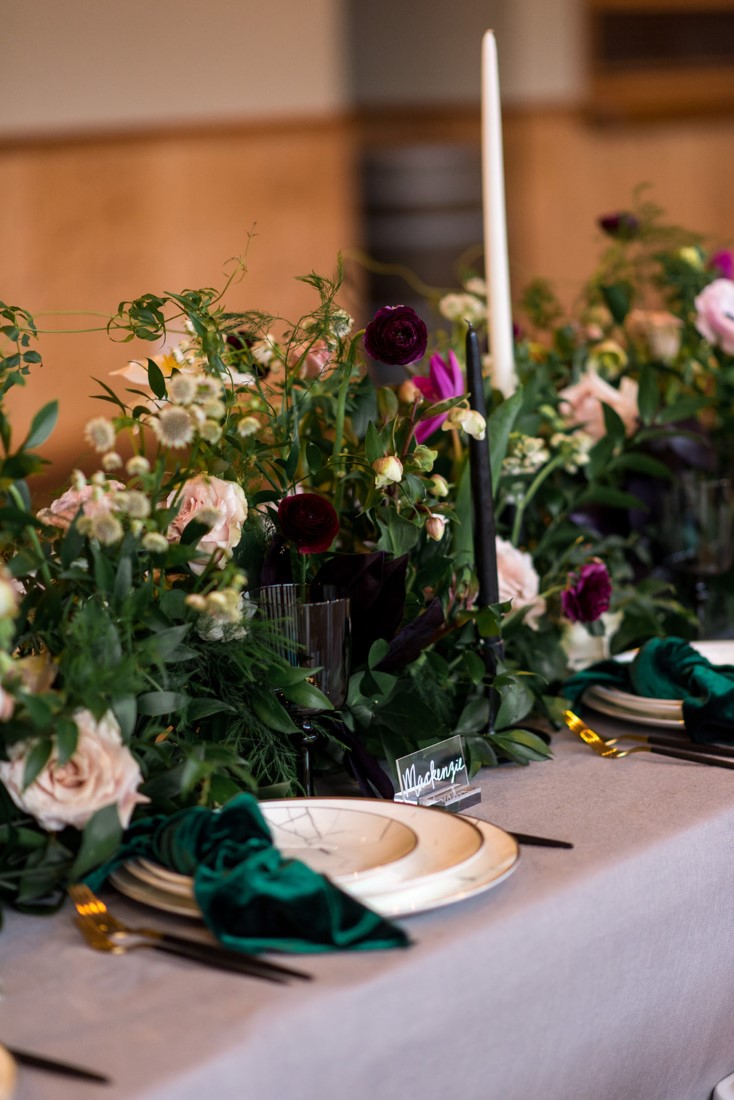 Wedding Reception talbe with greenery and roses and tall candlesticks by All Her Flowers Fraser Valley 