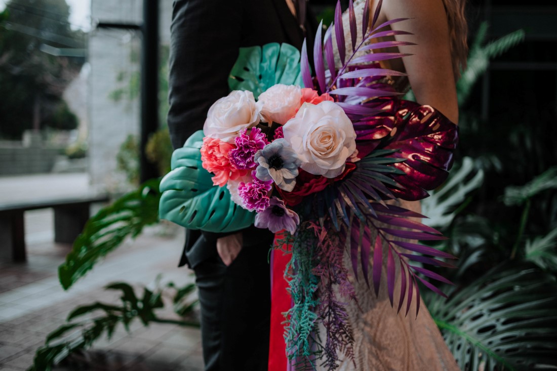 White peonies and anemones in bridal bouquet by En Vied Events