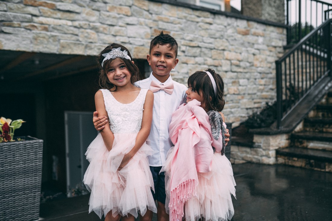 Flower girls and usher in pink and white 