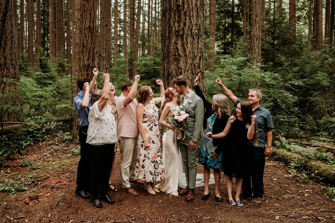 Heartfelt Elopement in Vancouver guests raise a glass to toast the newlyweds