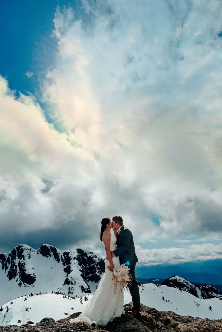 Wedding From Above Janayh Wright Photography mountaintop kisses