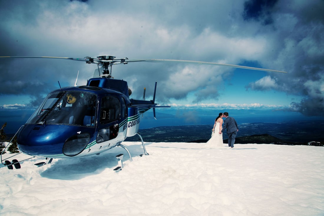 Wedding From Above Janayh Wright Photography wedding kisses in the snow