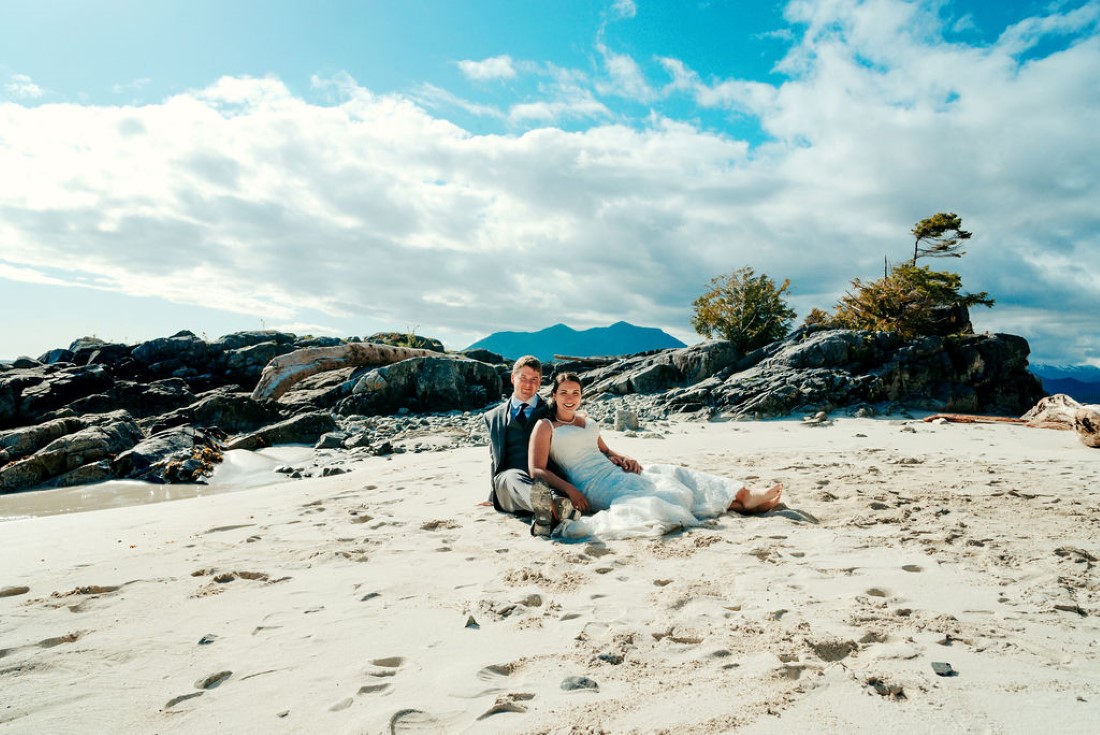 Wedding From Above Janayh Wright Photography couple sitting on sandy beach