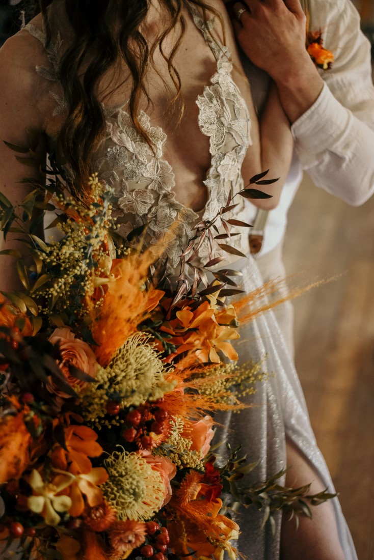 Deep Cove Winery Wedding Dayla Weiss Photo bride holding bouquet