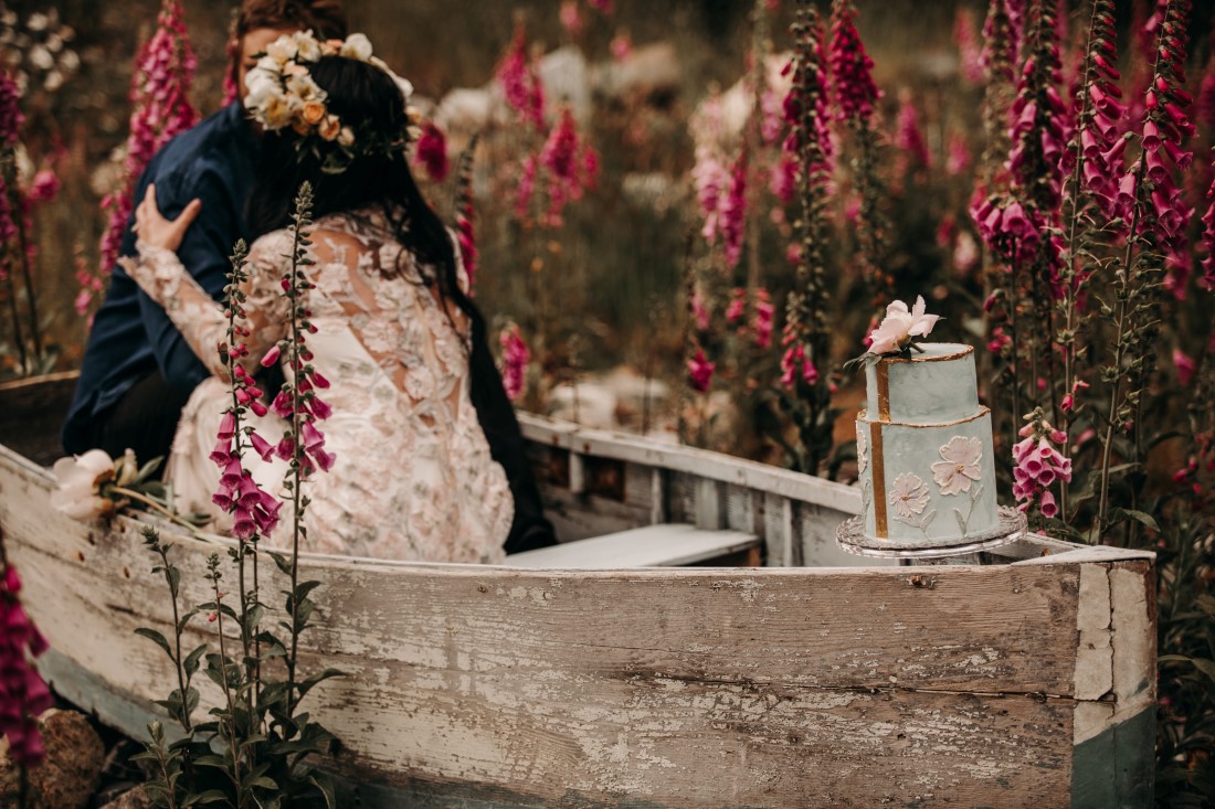 Foxgloves are Forever Island Moments Photography bride and groom boat embrace