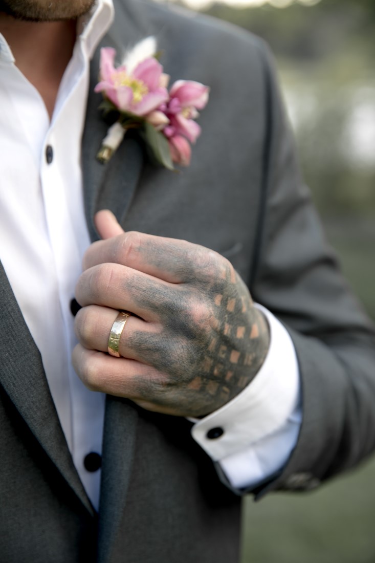 Purple Lilac Spring Wedding Hattie Root Photo groom wearing his ring