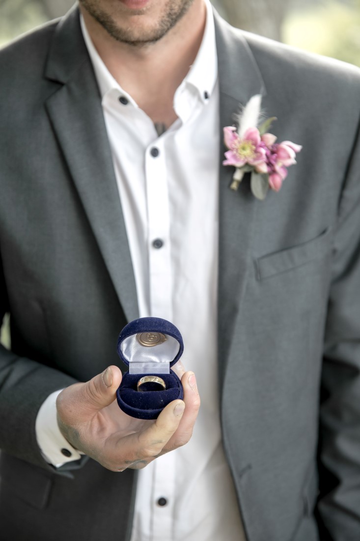 Purple Lilac Spring Wedding Hattie Root Photo groom holding ring