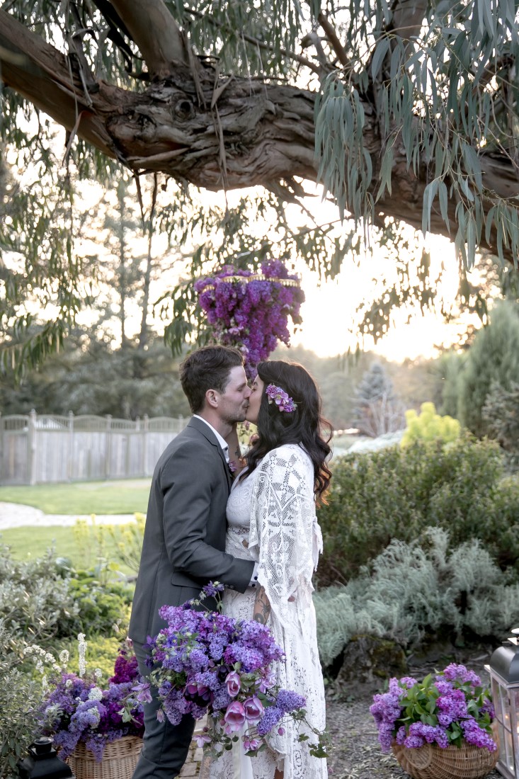 Purple Lilac Spring Wedding Hattie Root Photography bride and groom kissing