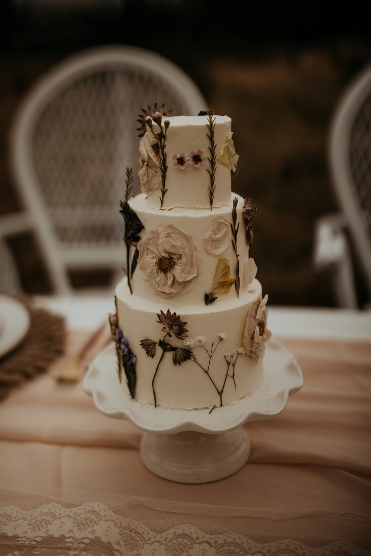 Romantic Cover for Vancouver Island Magazine Secret Waters Photography Wedding cake with dried pressed flowers