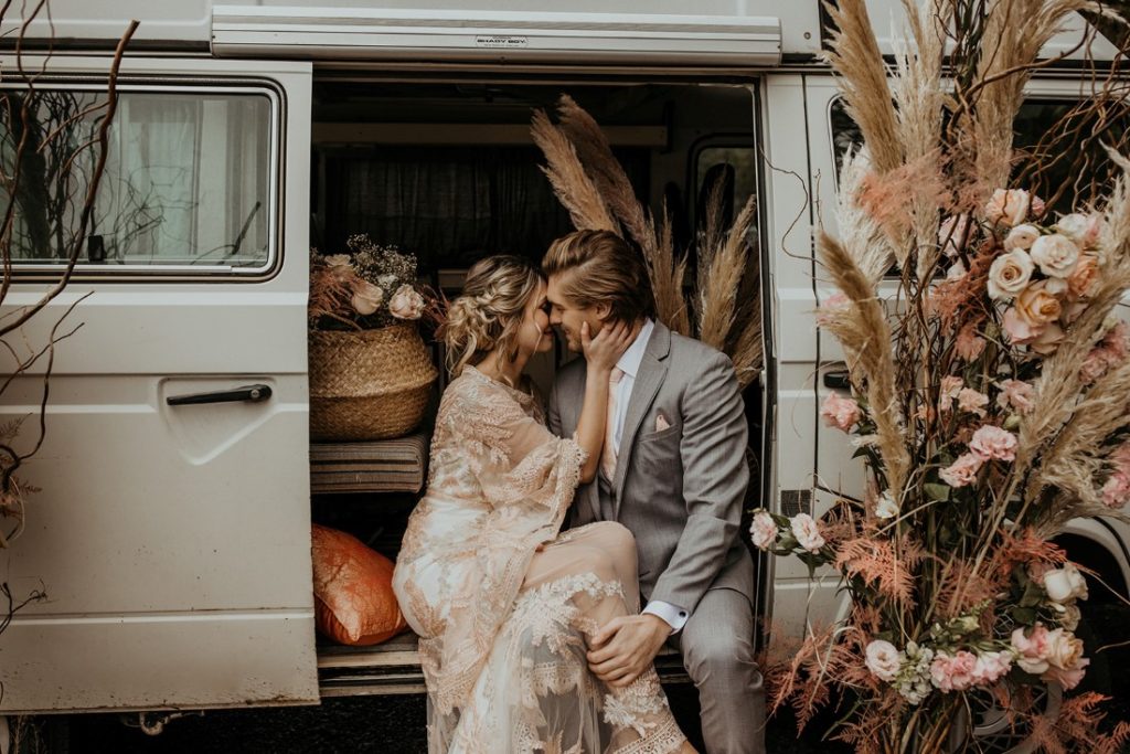 Romantic Cover for Vancouver Island Magazine Secret Waters Photography newlyweds kiss in Volkswagen van