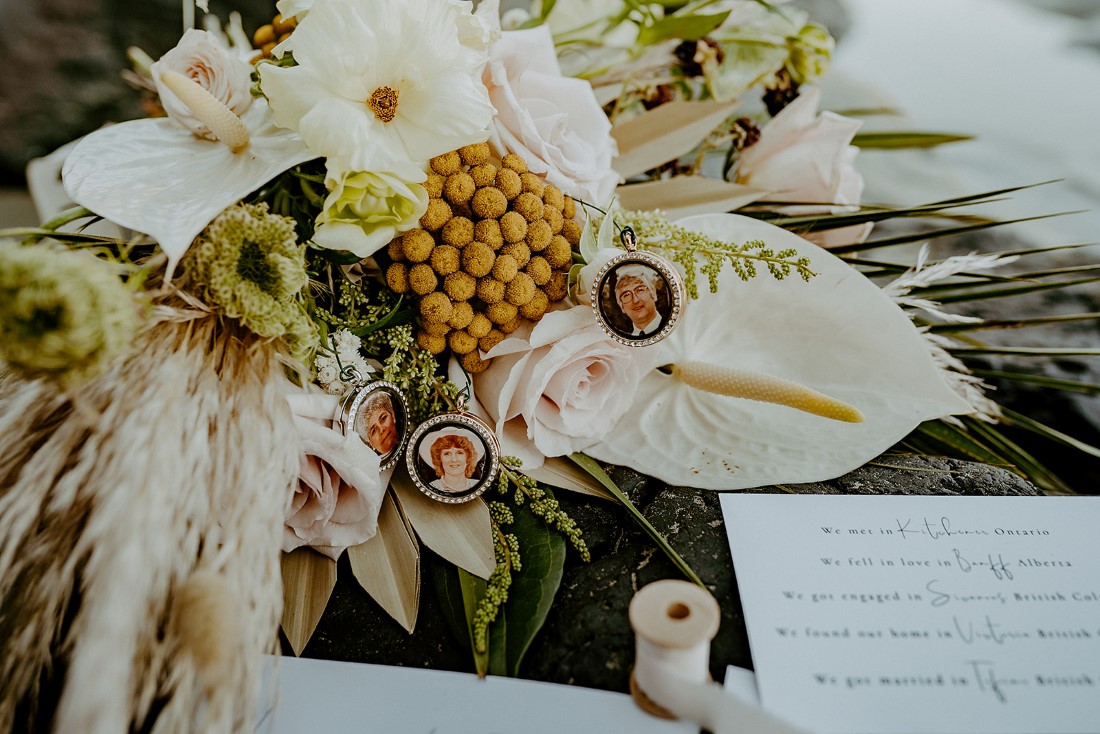 Bouquet with pictures of relatives attached by Crab Apple Floral Tofno