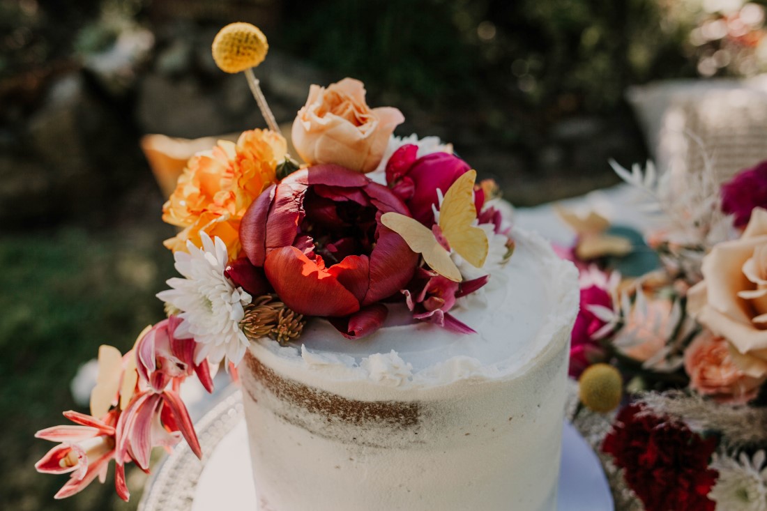 Wedding Cake with antique roses and paper butterflies by Cobble Hill Cake Co Vancouver Island