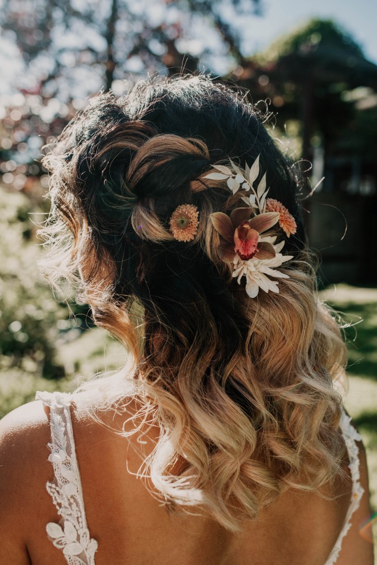 Flowers in bride's hair by Kendra Epp Vancouver Islnad