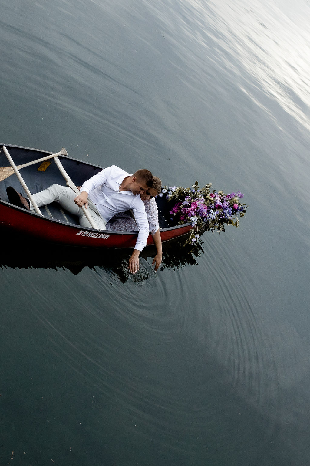 Adventure Elopement Groom in a canoe on Vancouver Island